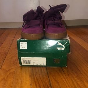 Purple suede pumas